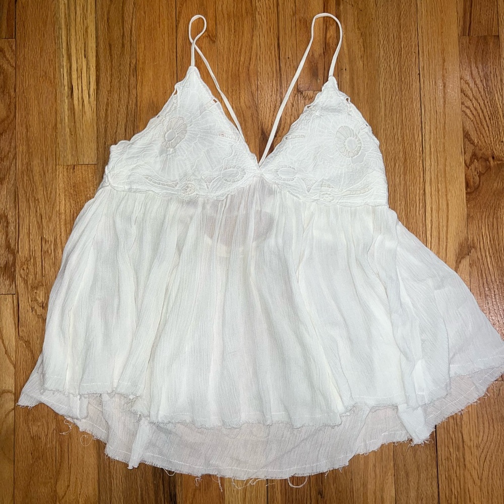 White flowy top